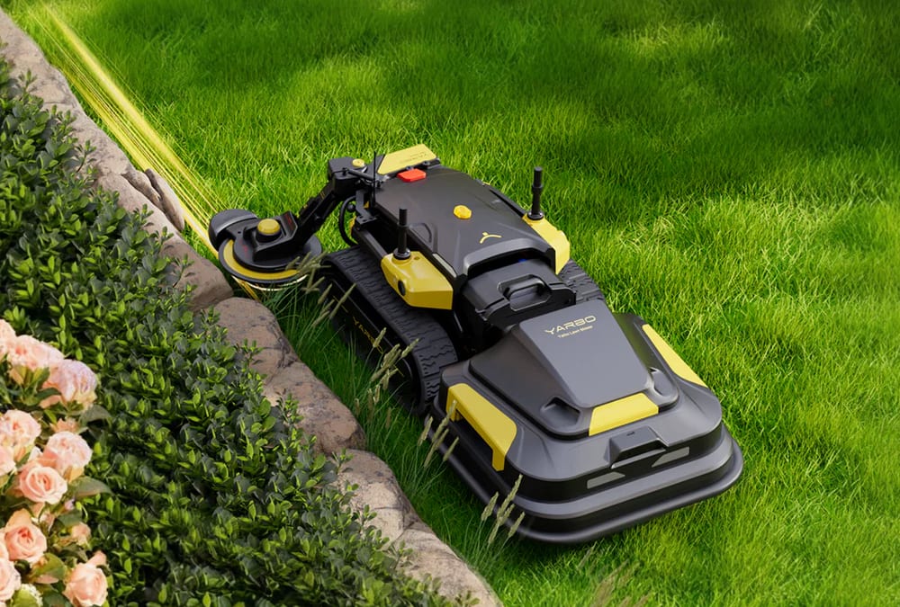 A Yarbo trimmer module edging along a lawn border